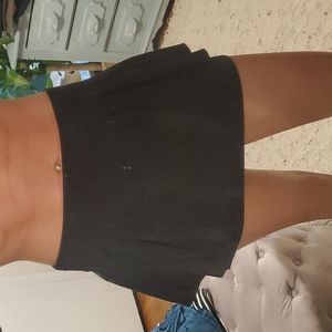 Black mini-skirt with top ruffle